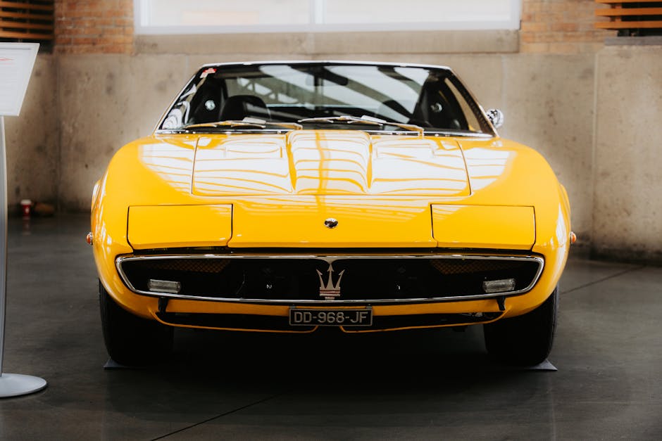 Glossy sports car demonstrating professional ceramic coating and auto detailing results